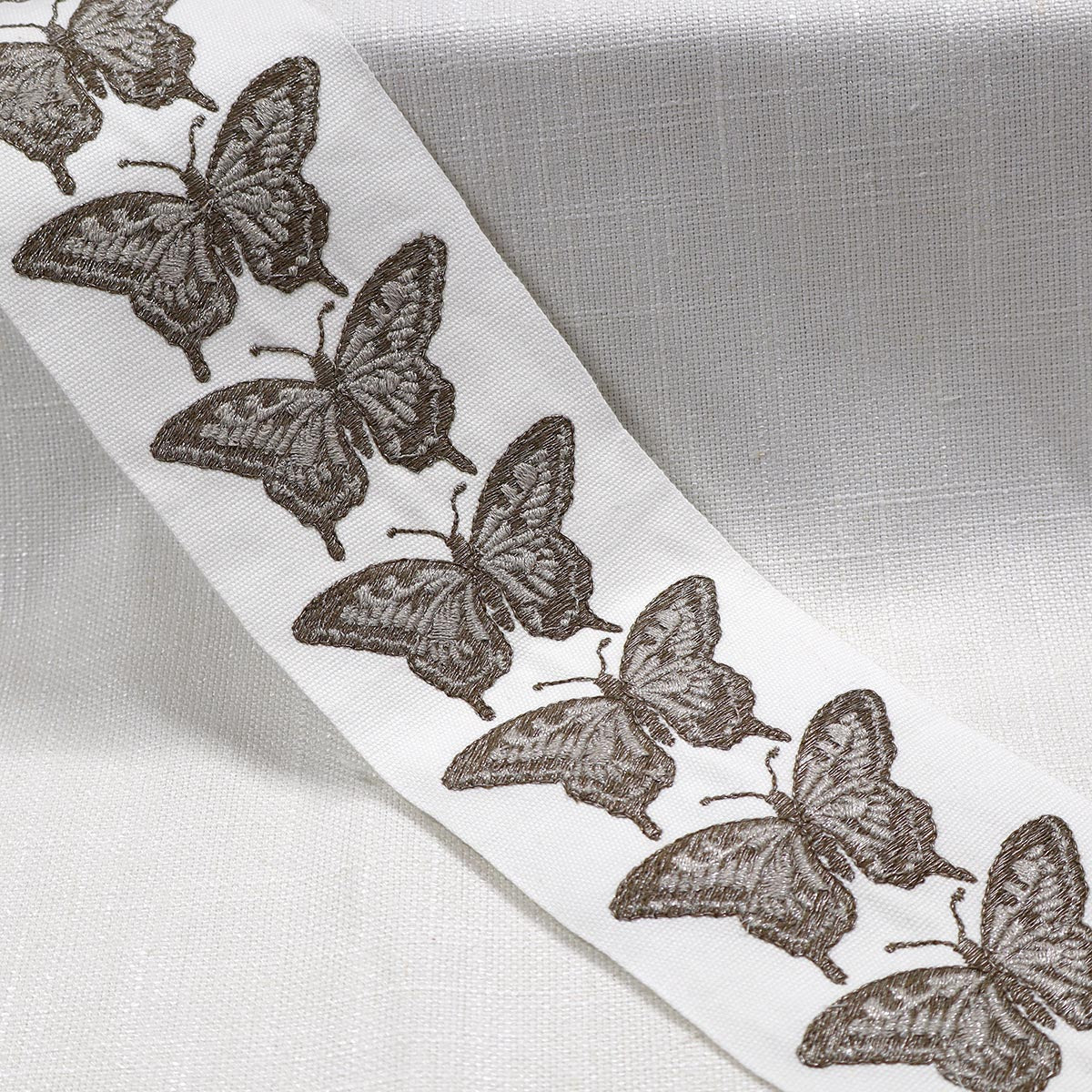 FLUTTER EMB TAPE NICKEL Magnolia Fabrics