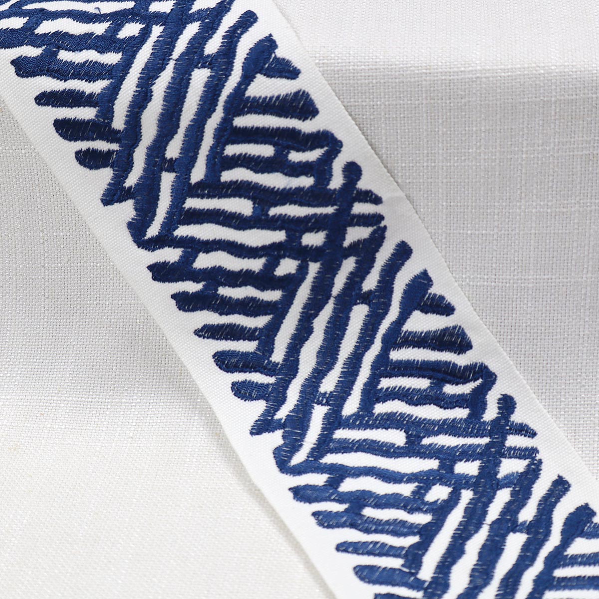 TRELLI EMB TAPE MARINE Mag Fabrics