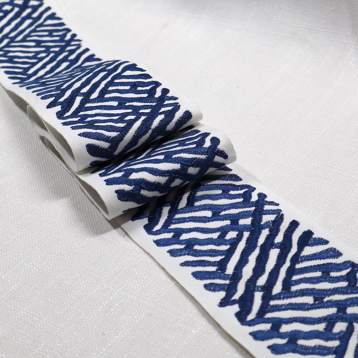 TRELLI EMB TAPE MARINE Mag Fabrics