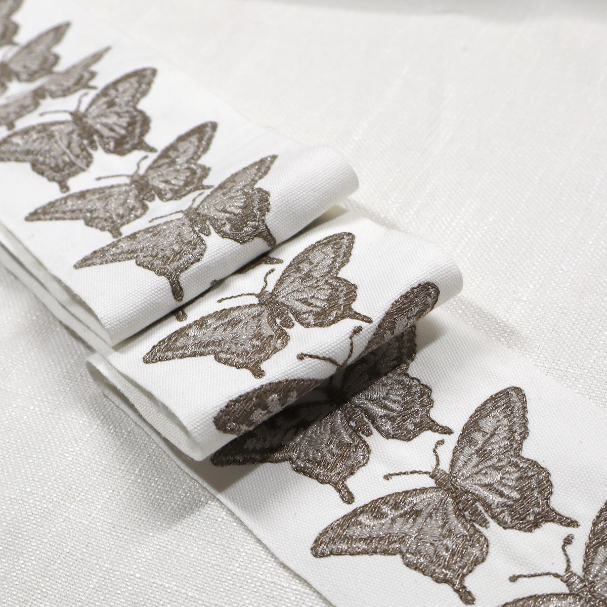 FLUTTER EMB TAPE NICKEL Magnolia Fabrics