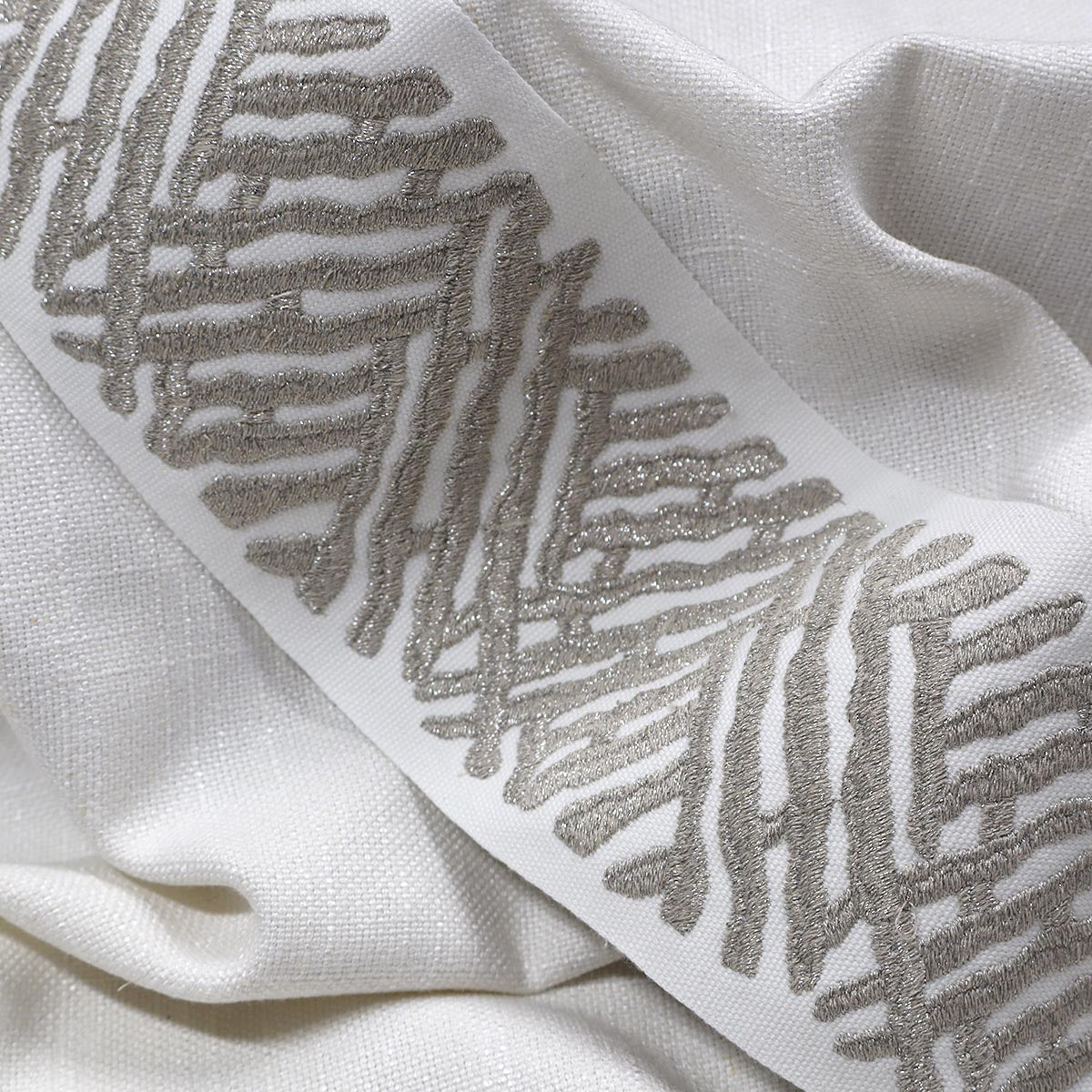TRELLI EMB TAPE PLATINUM Mag Fabrics